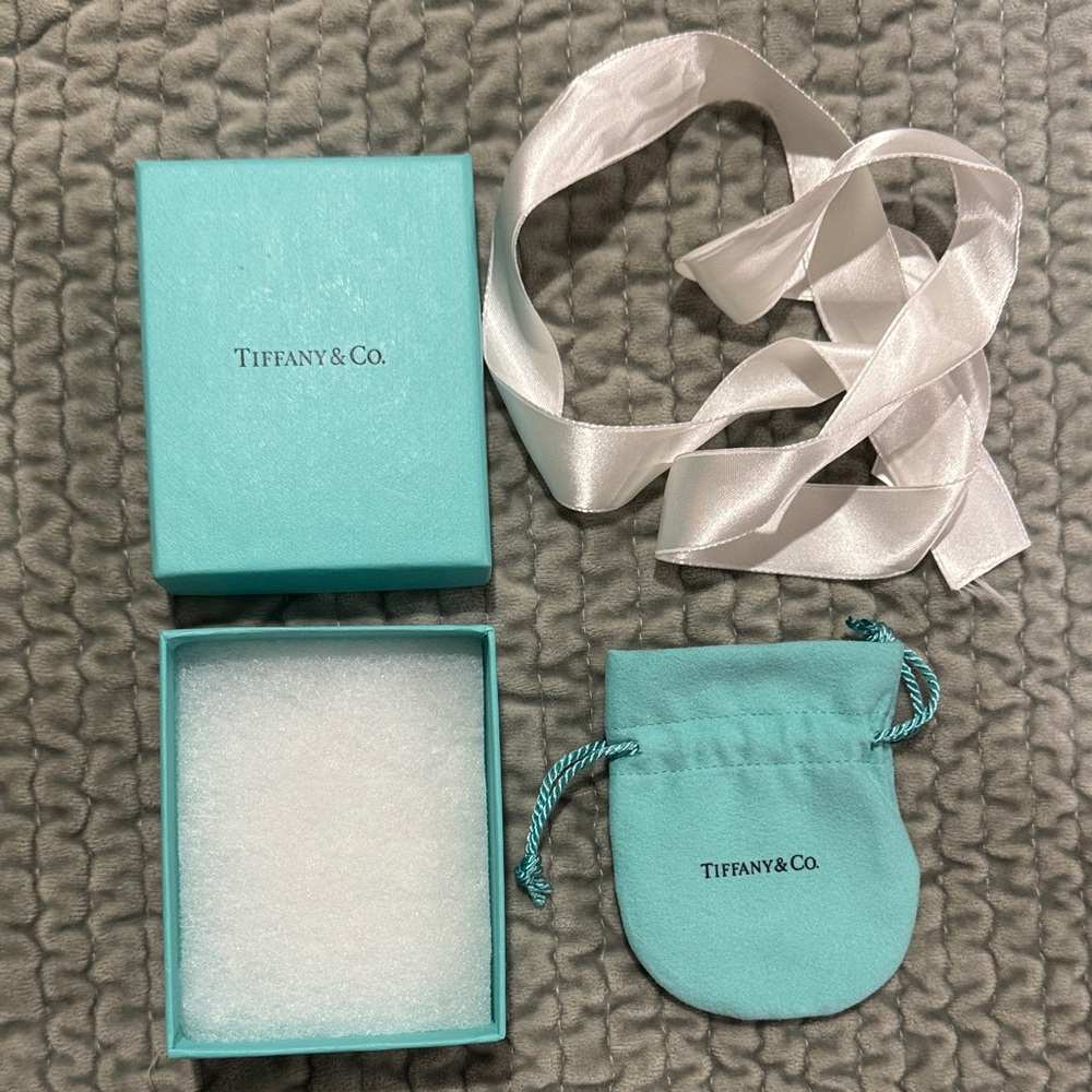 Tiffany & Co. Turquoise Box with White Ribbon